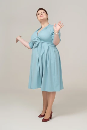 Happy woman in blue dress