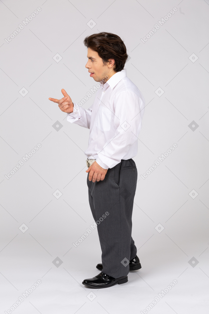 Side view of man talking and gesturing