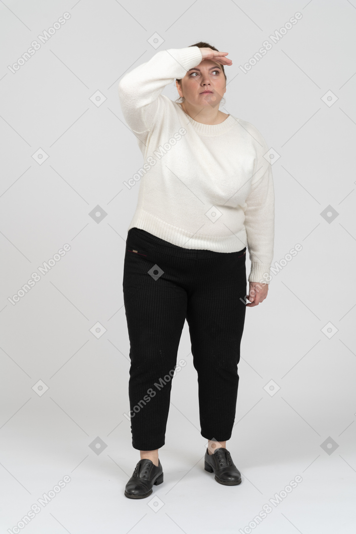 Front view of plus size woman looking for someone