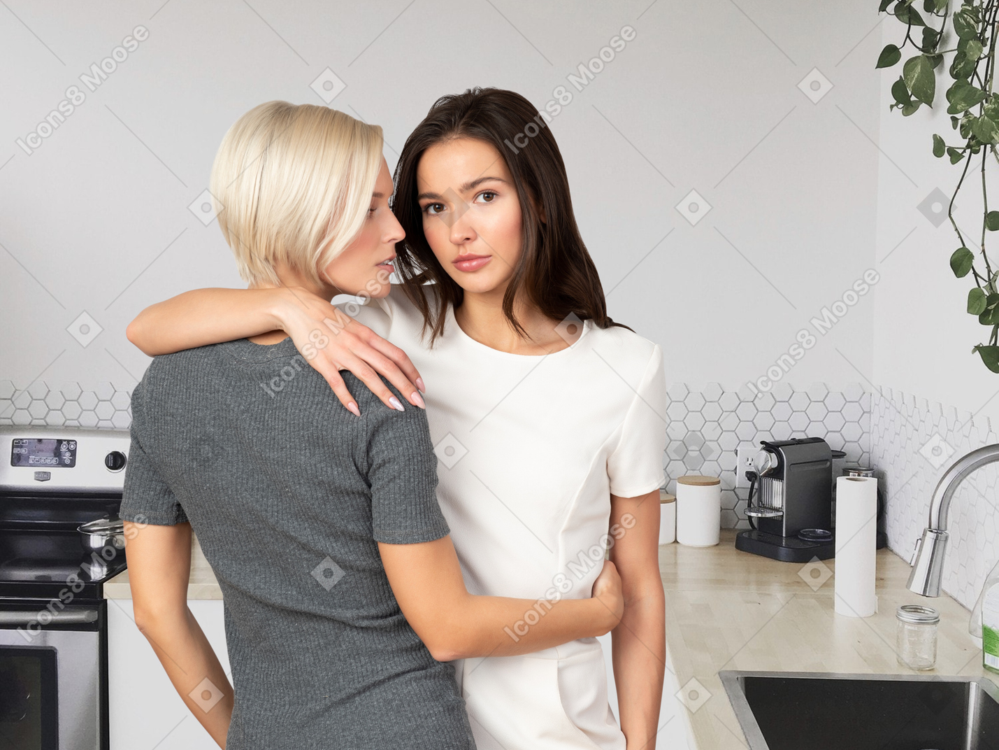 A couple of women holding each other