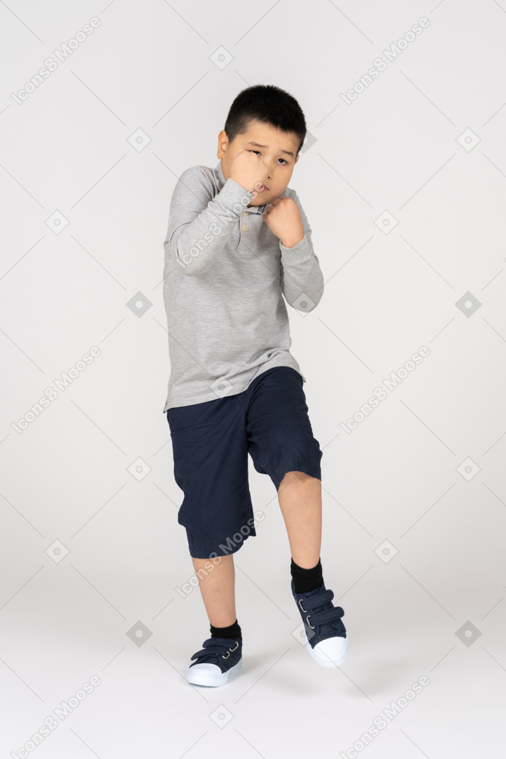 Boy with fists