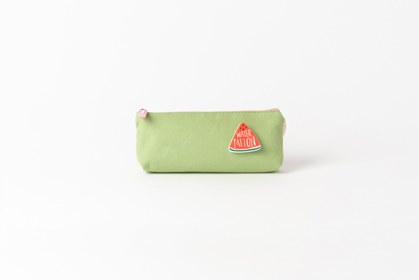 Green pencilbox with watermelon sign on it