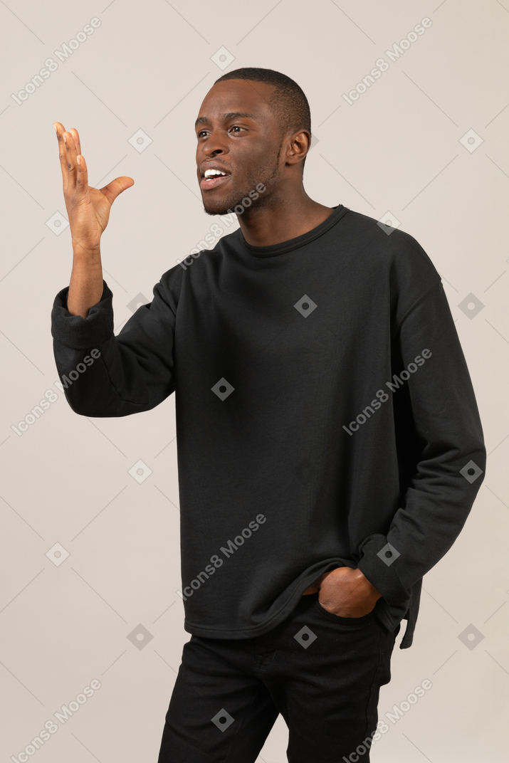 Black man gesturing with hand and communicating