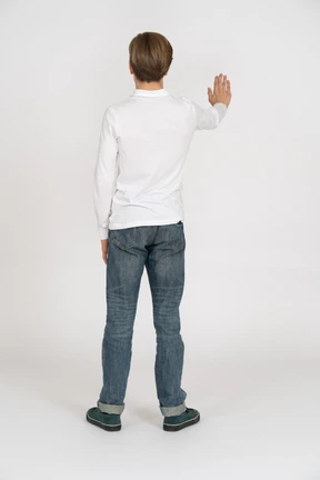 Young man in casual clothes standing