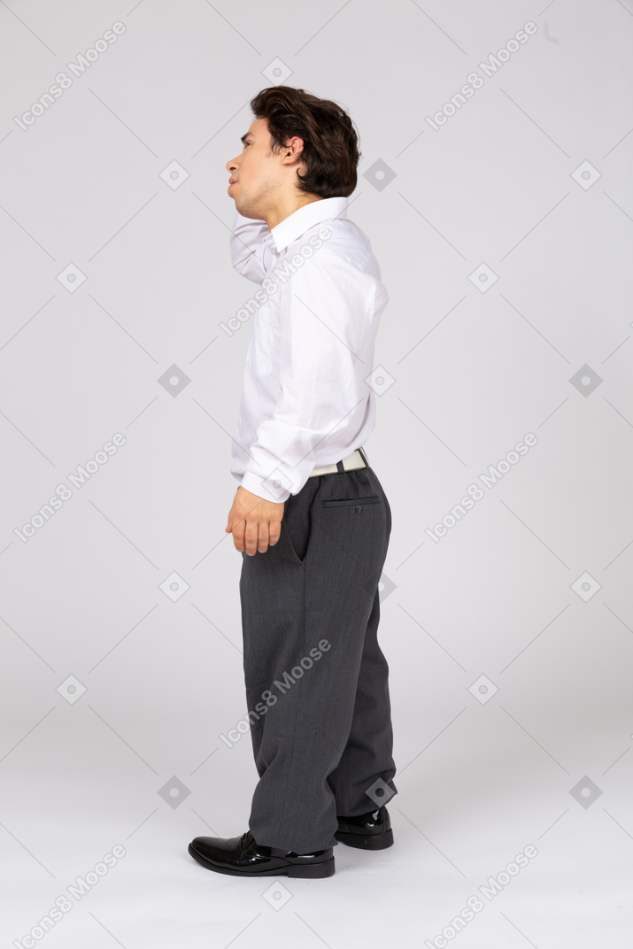 Side view of businessman with hand at head