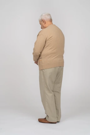 Side view of an old man in casual clothes