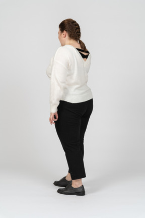 Side view of plump woman in casual clothes