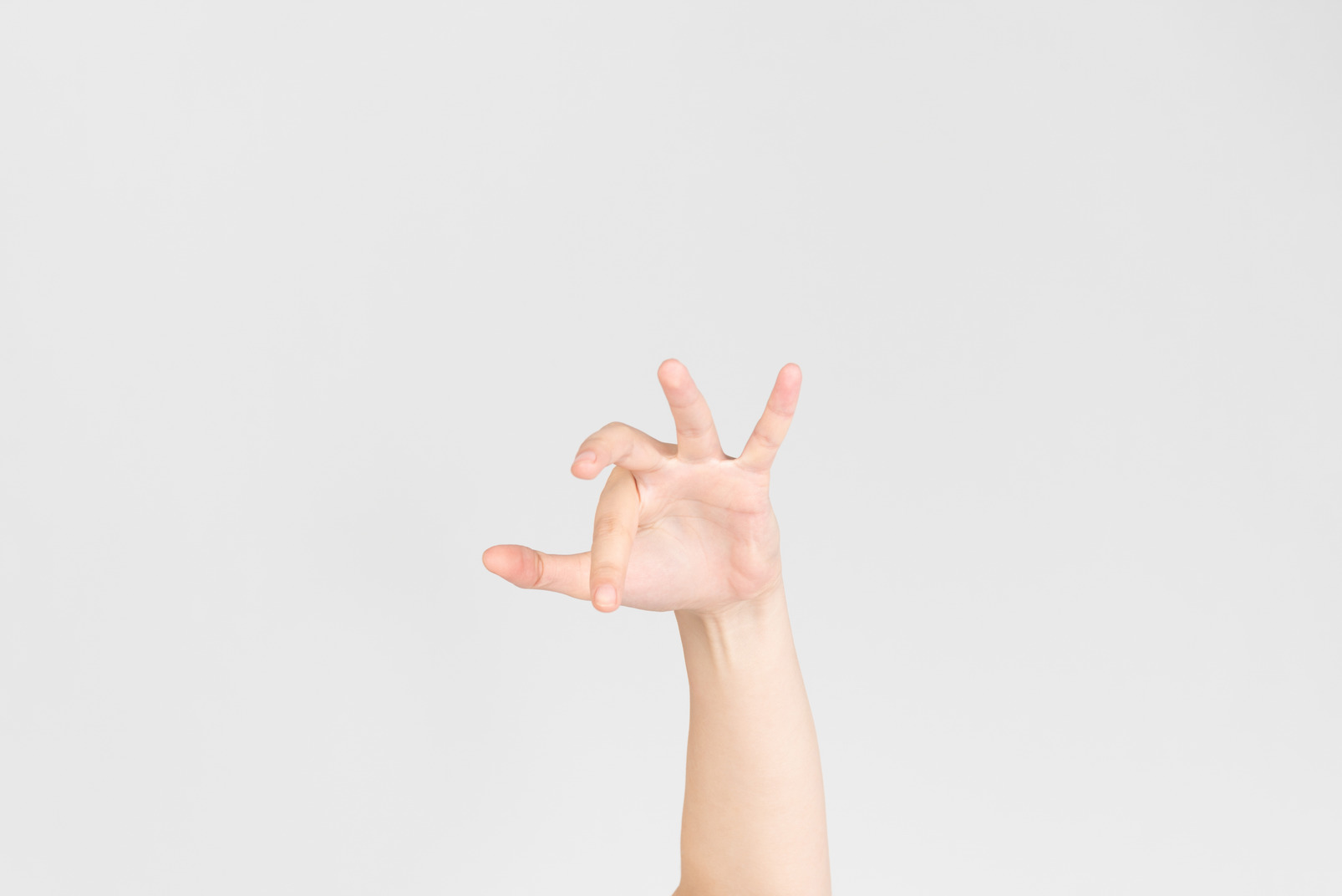 Female hand showing kind of scary gesture