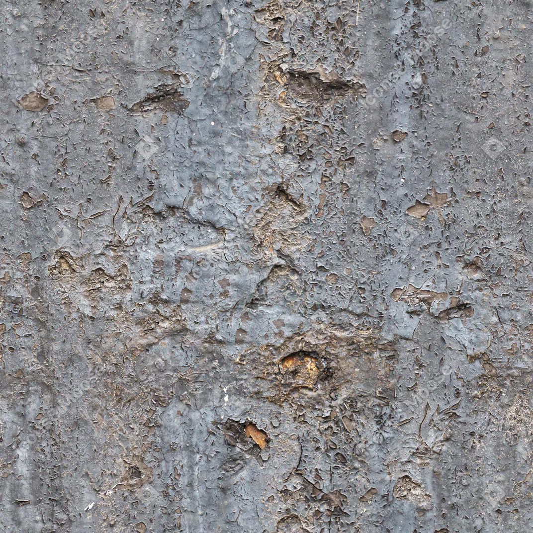 Ancienne couche de plâtre fissuré gris