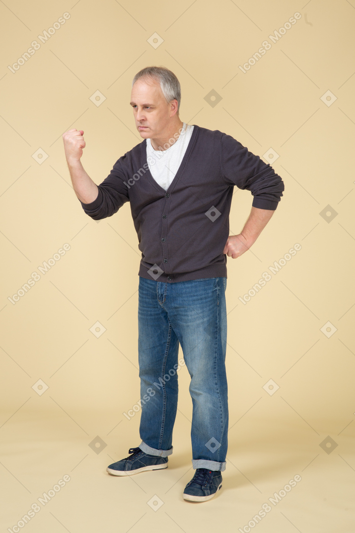 Man in casual clothes posing