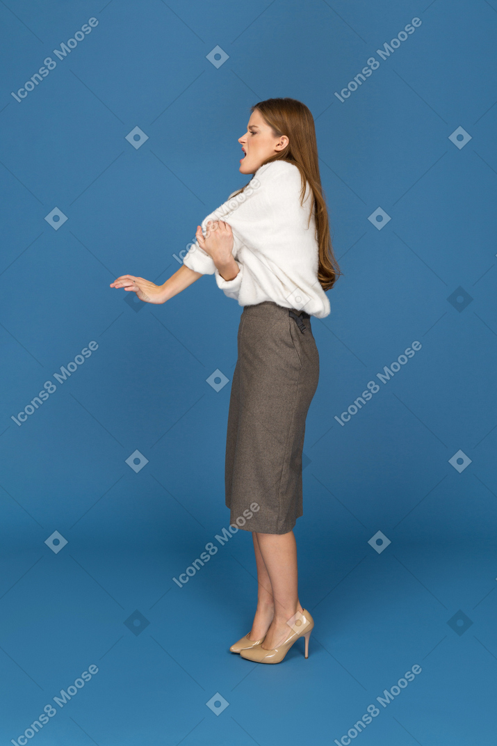 Young businesswoman feeling pain