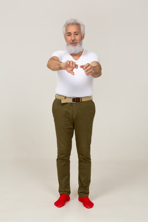 Man in casual clothing with his arms outstretched