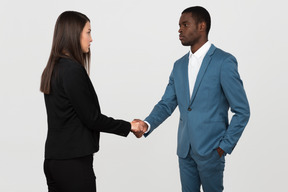 Exchanging handshakes with new colleague