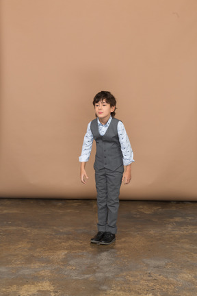 Front view of a boy in suit