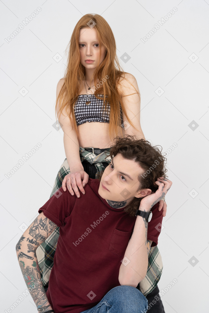Teenage girl leaning on her friend's shoulders