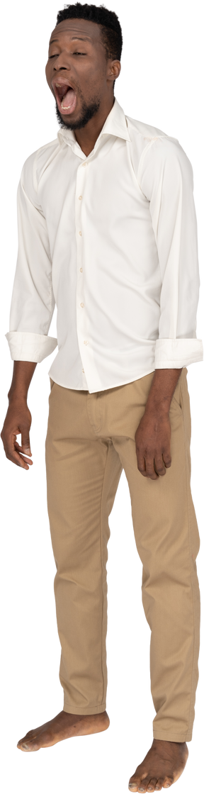 Man in white shirt standing