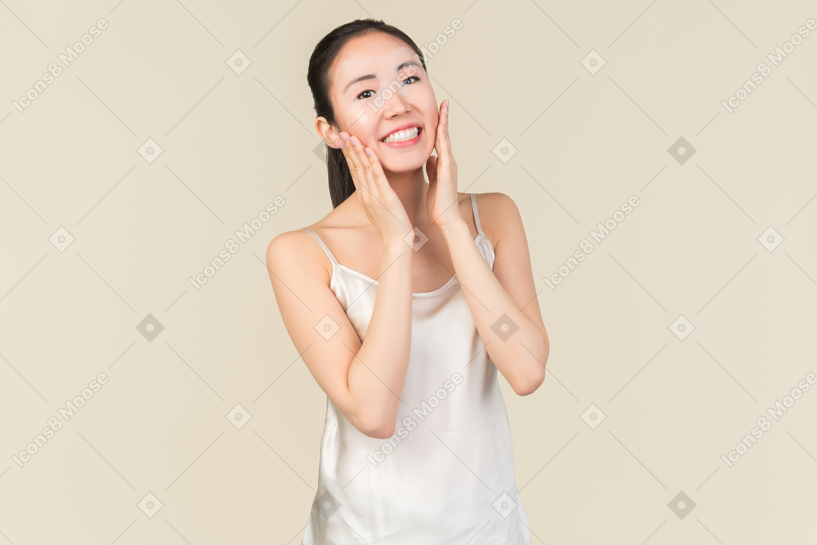 Young asian girl wearing face mask and touching her face with hands