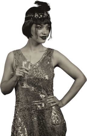 A charming flapper holding a glass of champagne