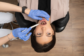 Paciente na cadeira do dentista