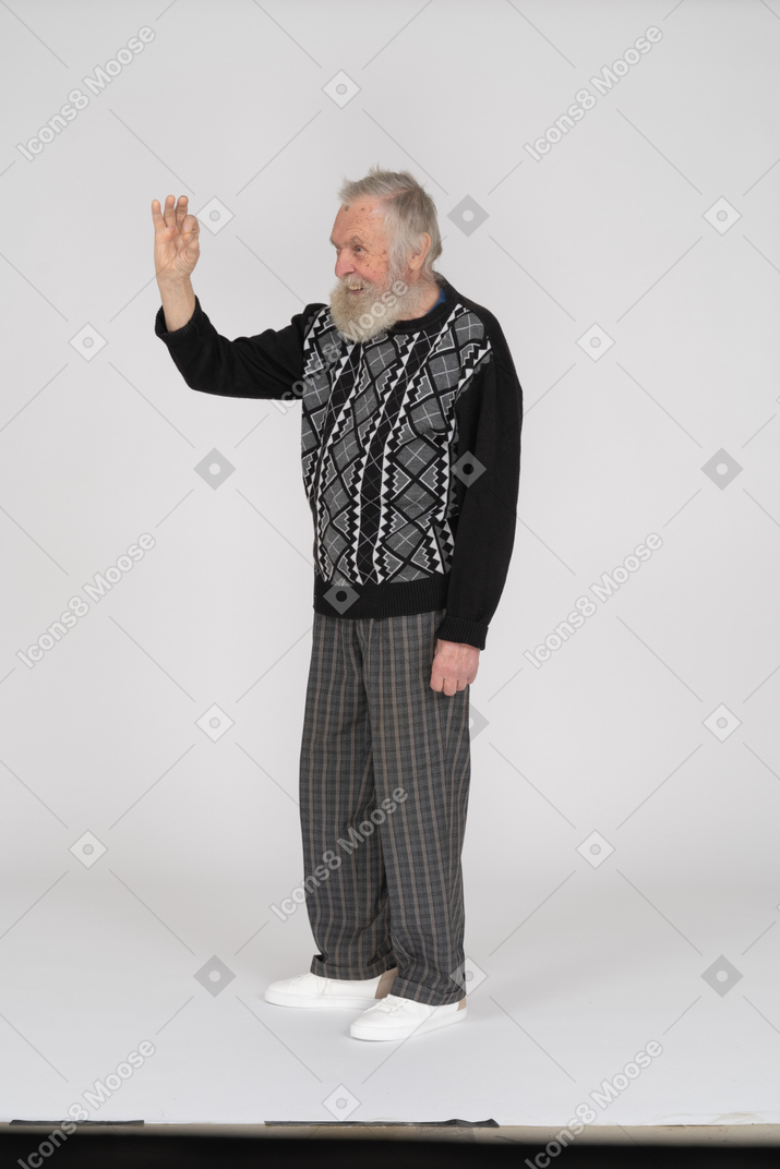 Old man showing ok sign and smiling