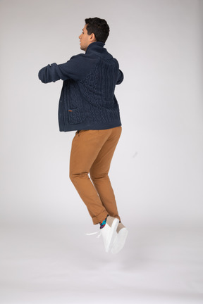 Man in casual clothes jumping