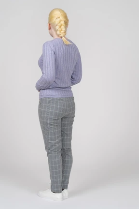 Back view of a young woman with braided hair