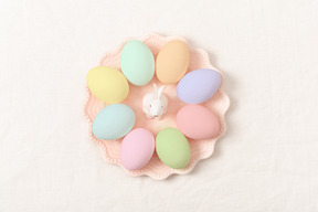 A plate with colorful easter eggs
