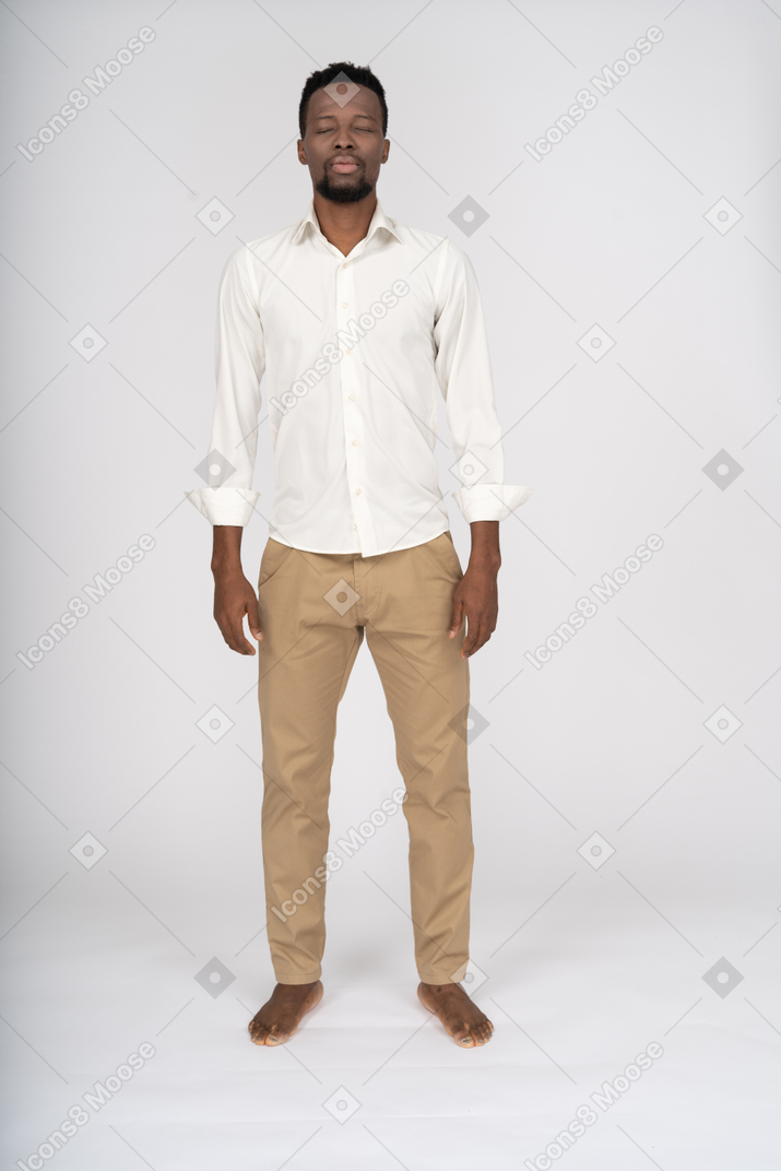 Man in white shirt standing