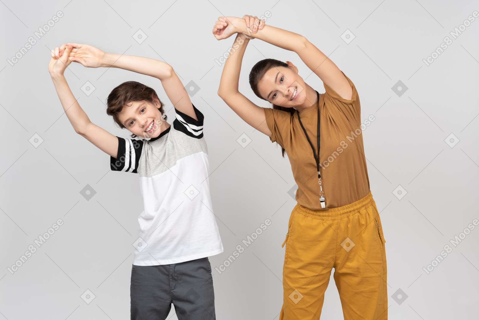 Physical education teacher and pupil exercising