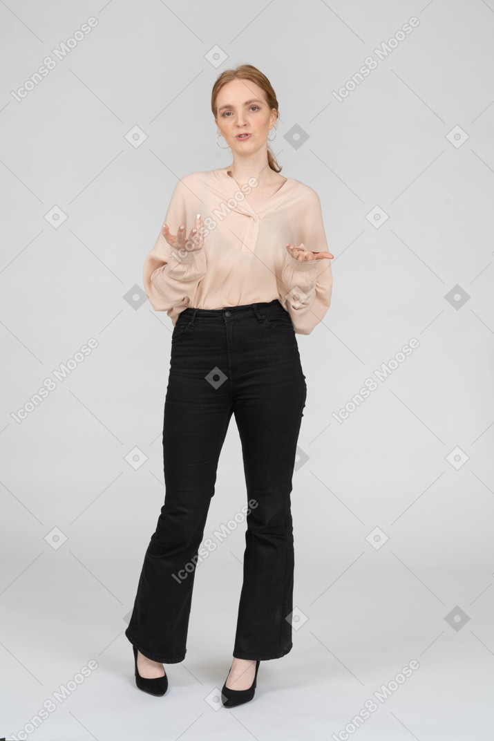 Woman in beautiful blouse standing