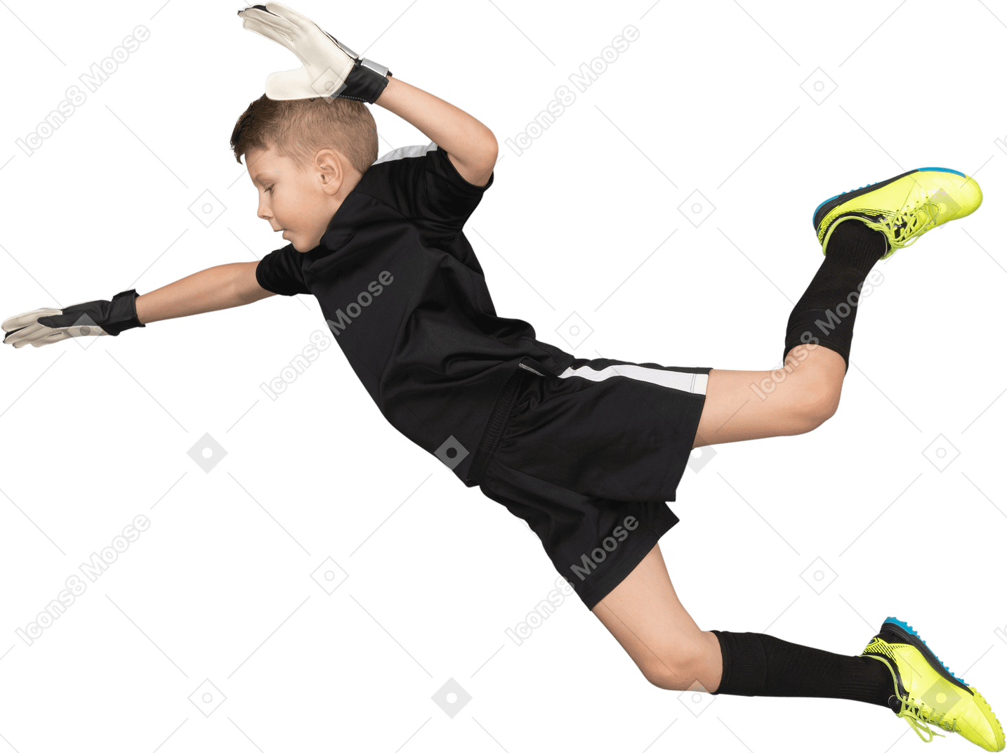 Side view of a kid boy goalkeeper jumping and outstretching hands
