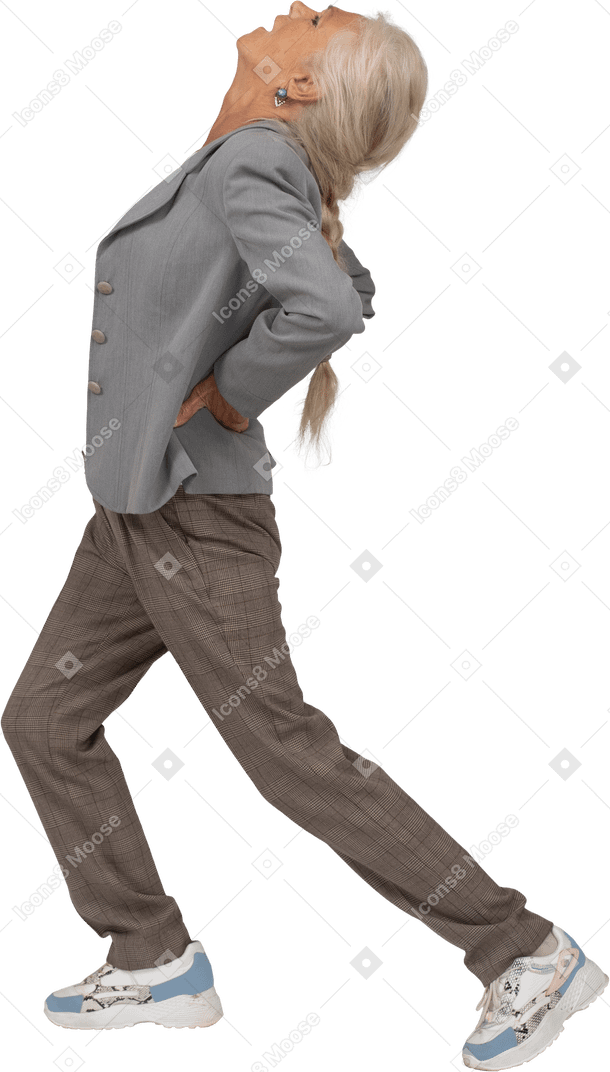 Side view of an old lady in suit doing yoga