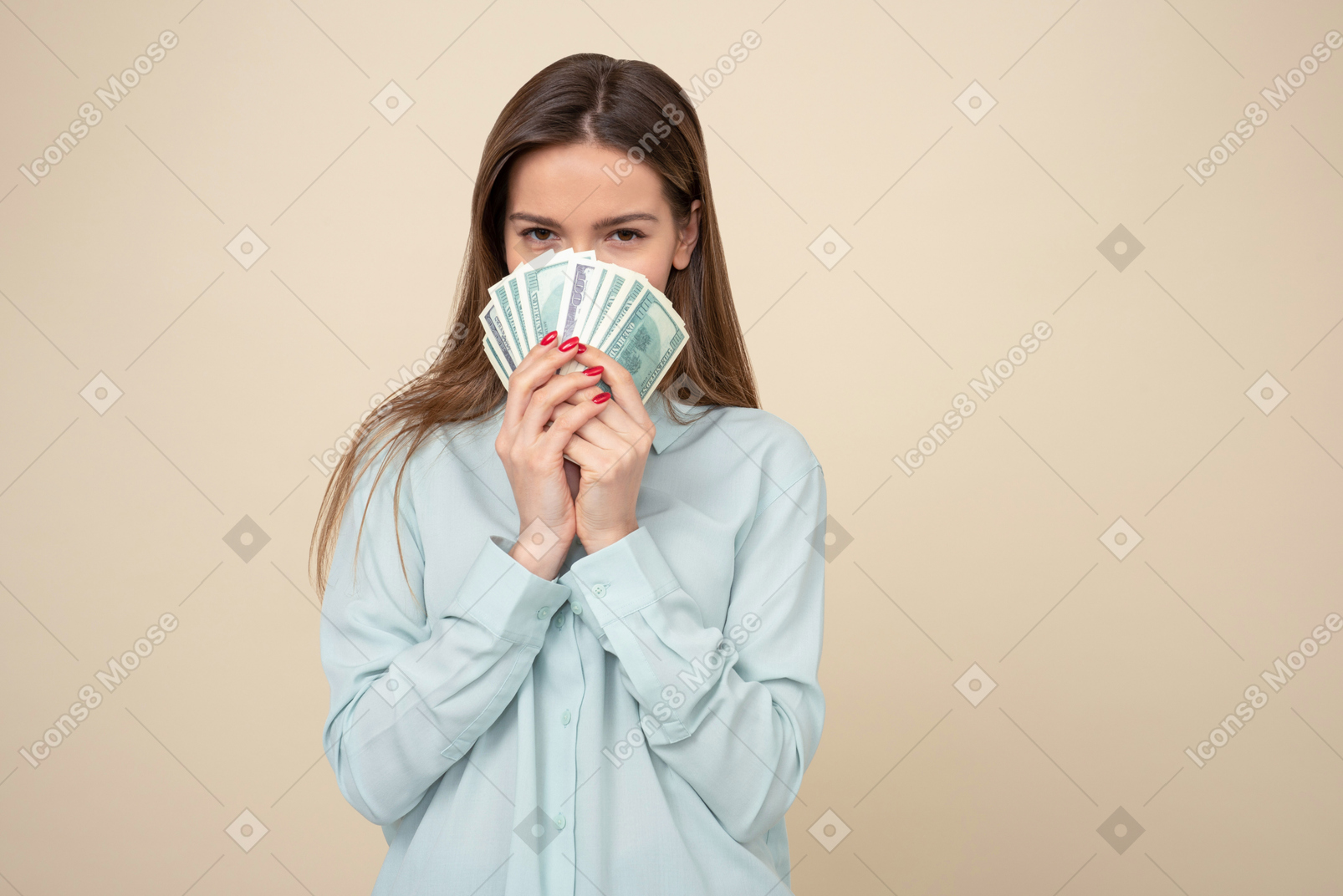 Attractive woman holding dollar bills