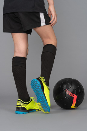 Close-up of a soccer player's legs