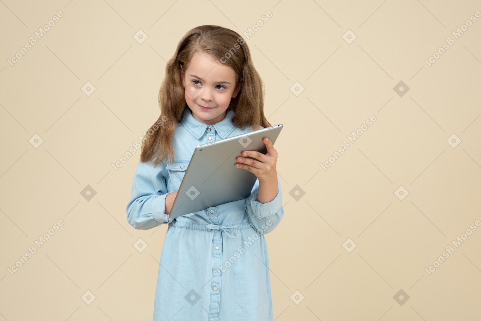 Cute little girl using a tablet