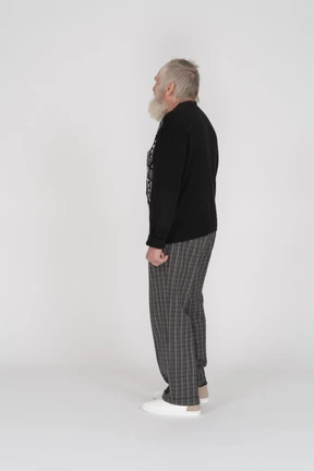 Side view of an elderly man looking away