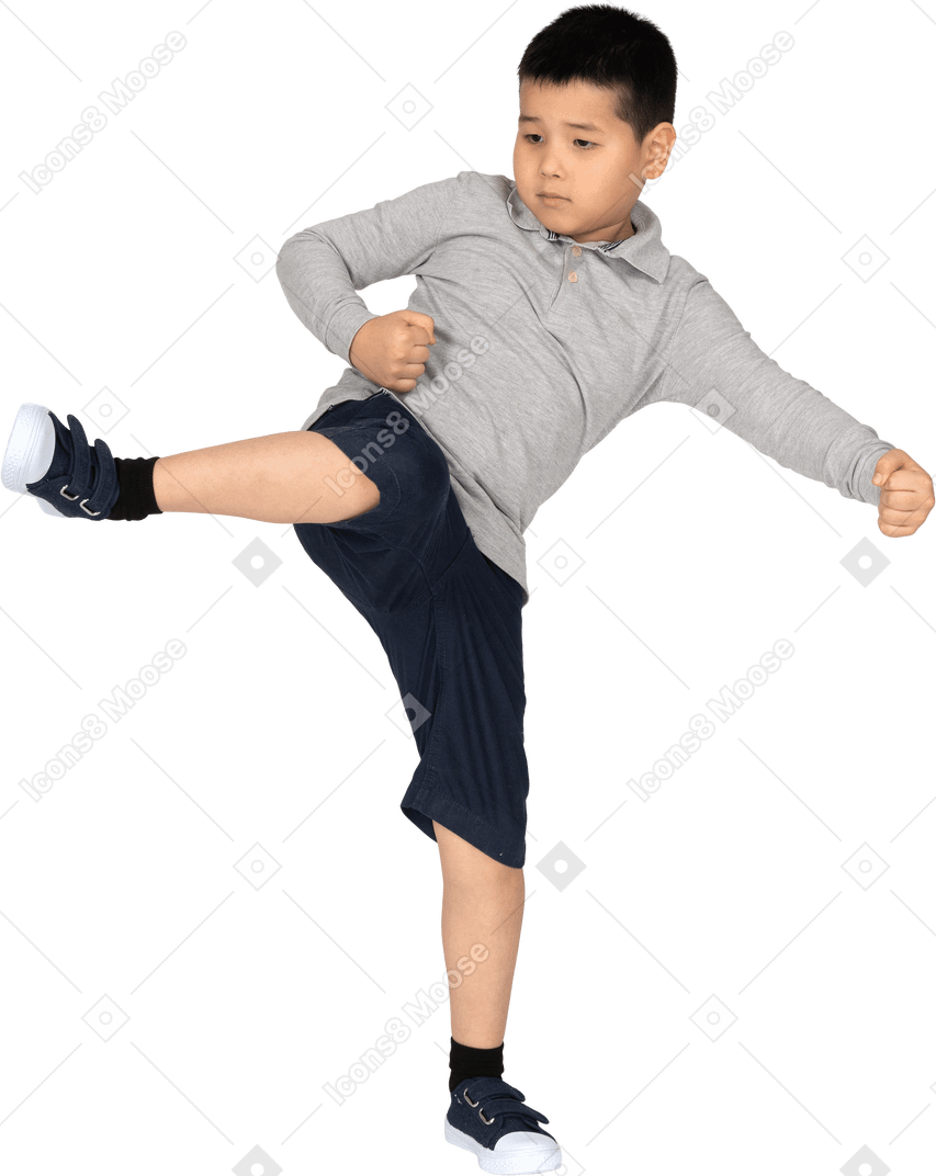 Front view of a boy with his leg up