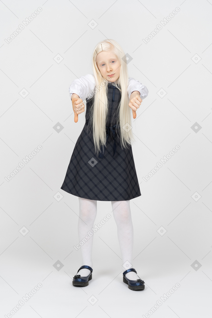 Schoolgirl with long hair showing thumbs down