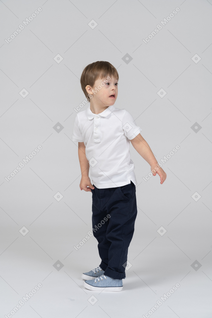 Little boy turning around