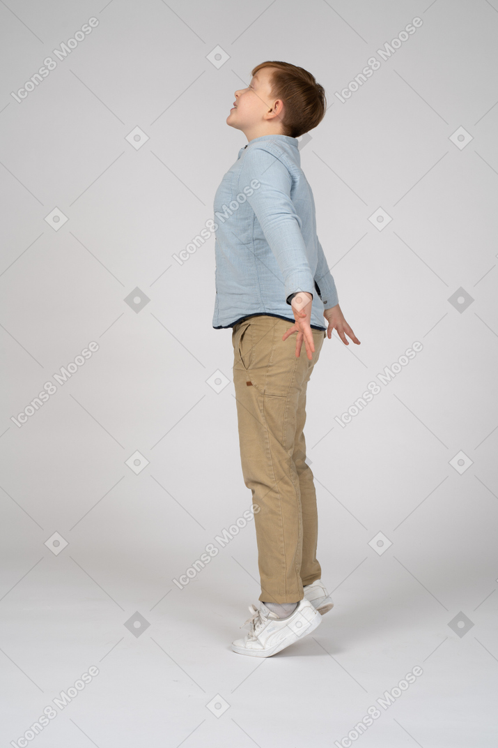 Side view of a boy jumping