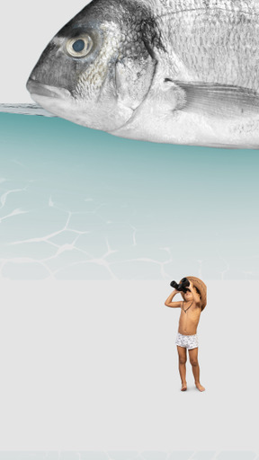 A boy looking up at a giant fish through binoculars