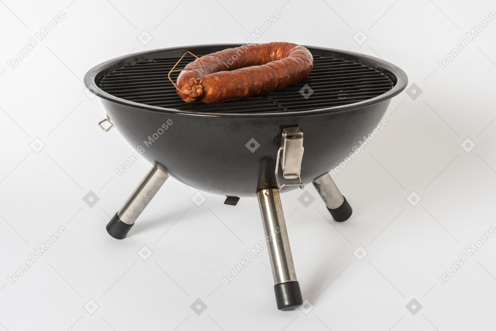 Sausage on grill on white background