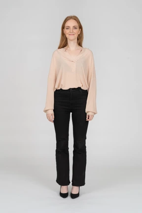 Woman in beautiful blouse standing
