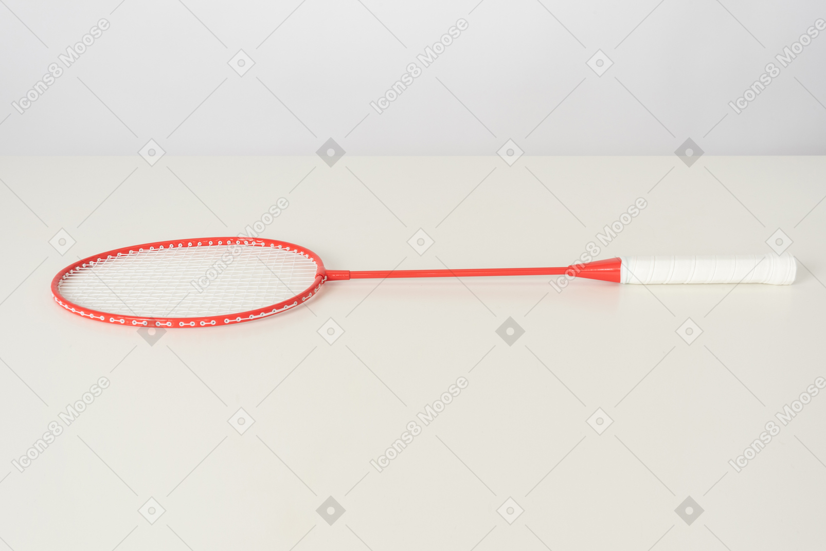 Red tennis racket on a white backgroud