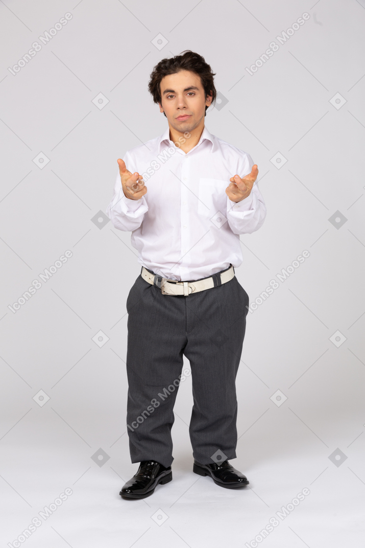 Male office worker crossing his fingers
