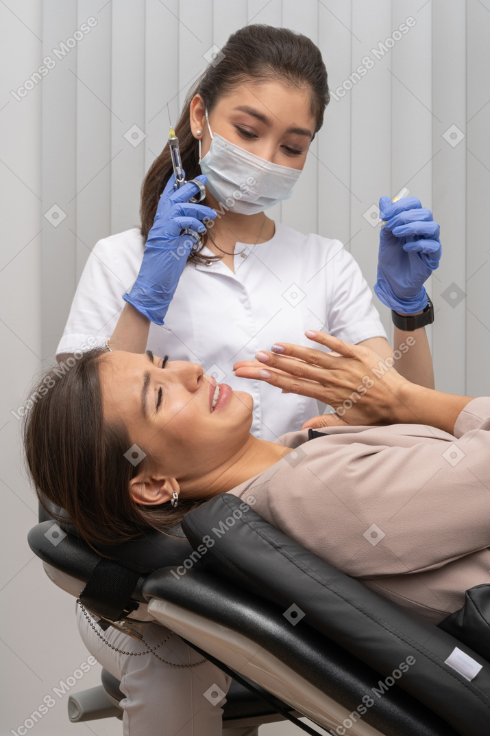 A dentist working with a patient