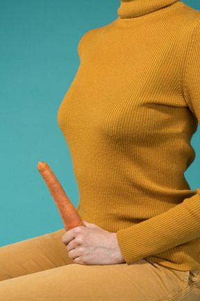 Holding a carrot