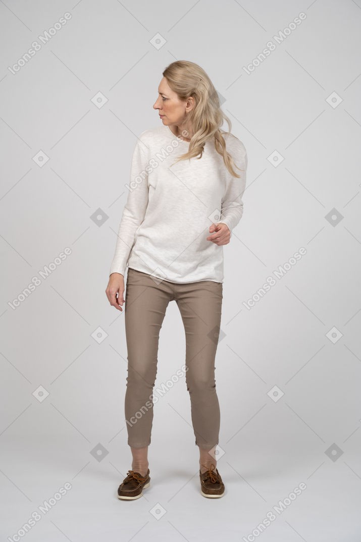 Woman in casual clothes standing