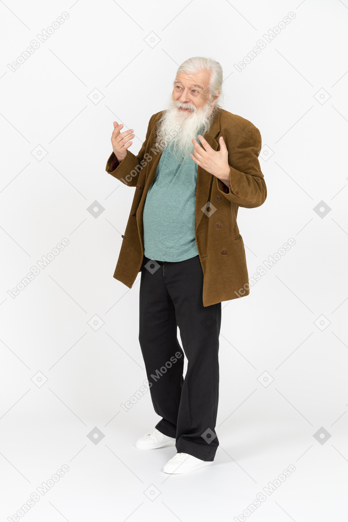 Elderly man raising his hands and smiling