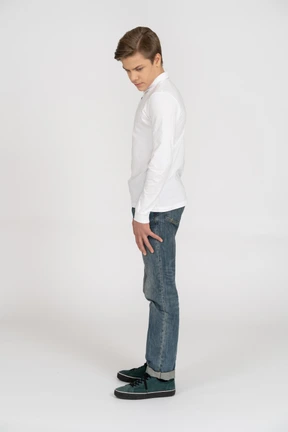 Young man in casual clothes standing